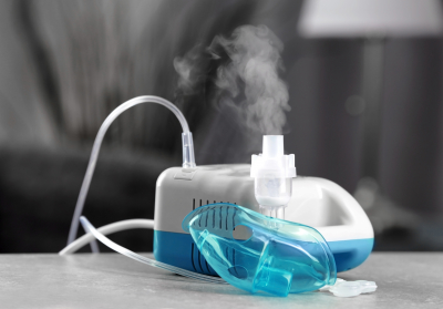 compressor nebulizer with mask on table