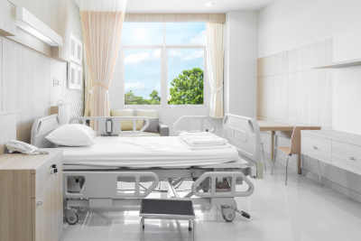 hospital room with beds and comfortable medical equipments