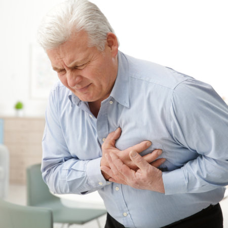 man suffering from chest pain