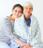 smiling senior woman with her daughter