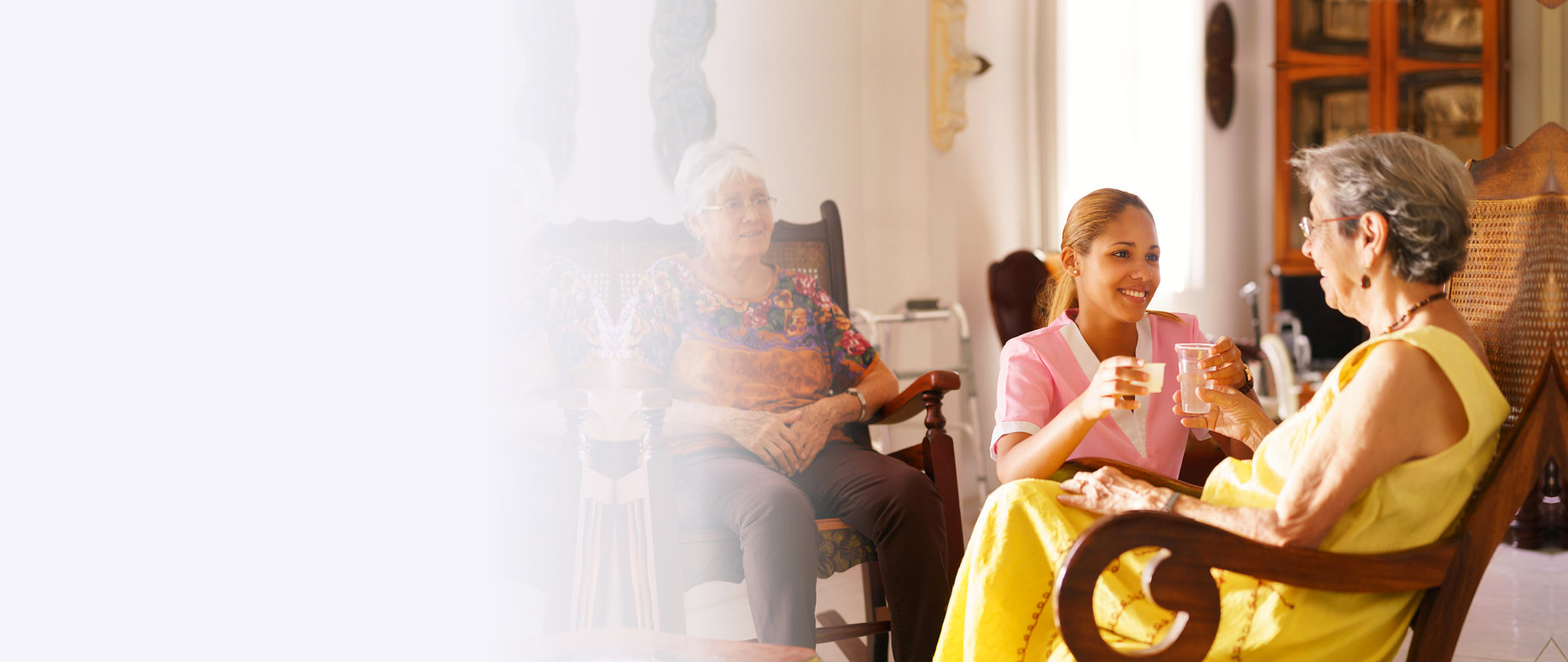 senior woman talking with her caregiver
